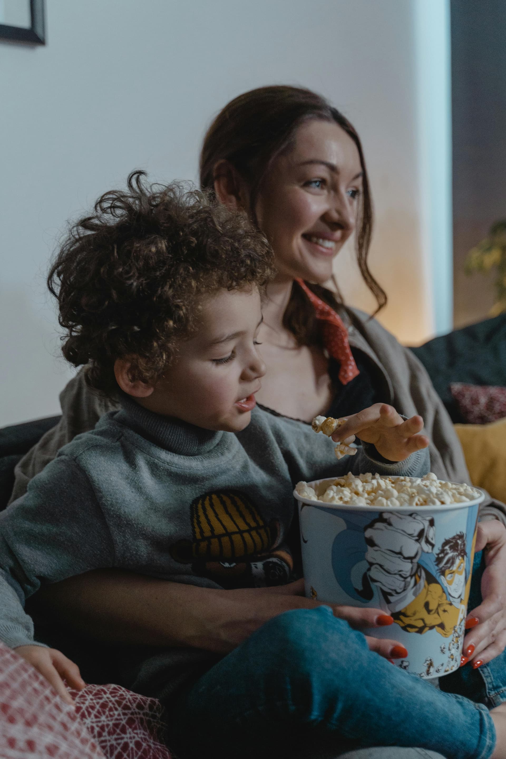Family enjoying a movie night in a home theater setup